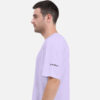 Lavender oversized unisex T-shirt featuring the “Tribal bay” logo on the left shoulder.